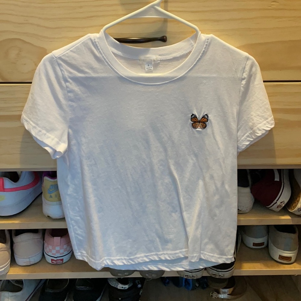 White crop top with butterfly patch